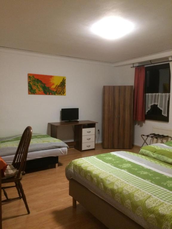Postel nebo postele na pokoji v ubytování Abels Appartements