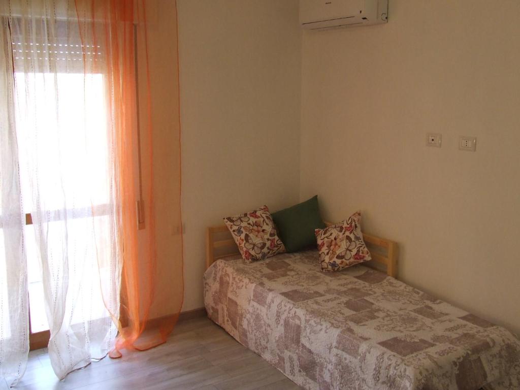 Postel nebo postele na pokoji v ubytování Leolù Guesthouse Alghero