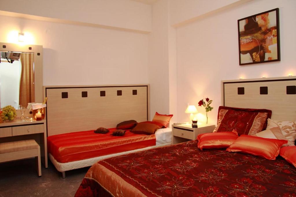 Postel nebo postele na pokoji v ubytování Nancy Hotel
