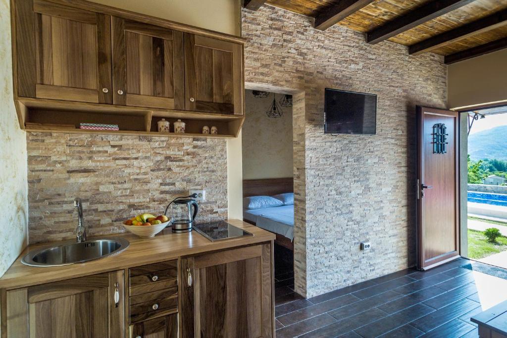 Kuchyň nebo kuchyňský kout v ubytování Eco Villas Merak