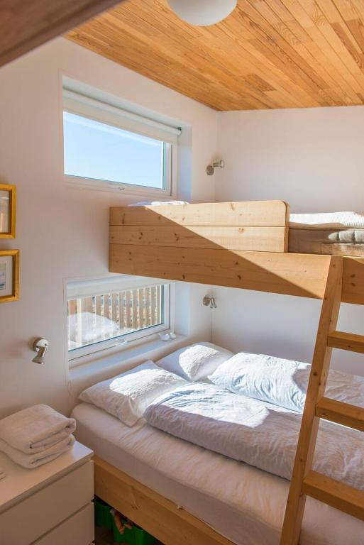 Postel nebo postele na pokoji v ubytování Nefsholt