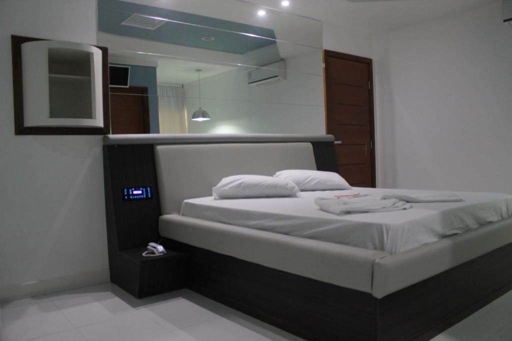 Postel nebo postele na pokoji v ubytování Motel Chalo