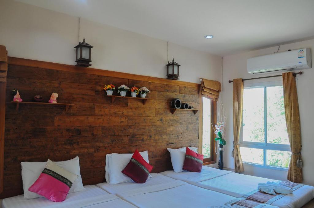 Postel nebo postele na pokoji v ubytování Pai Iyara Resort