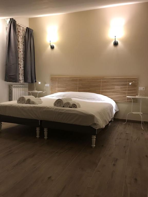 Łóżko lub łóżka w pokoju w obiekcie Villa Lò