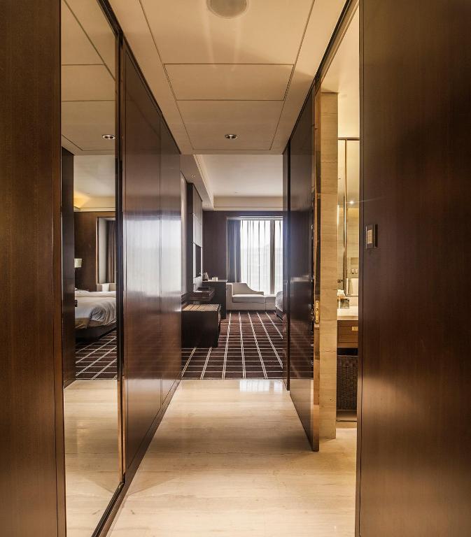 Postel nebo postele na pokoji v ubytování Royal Century Hotel Shanghai