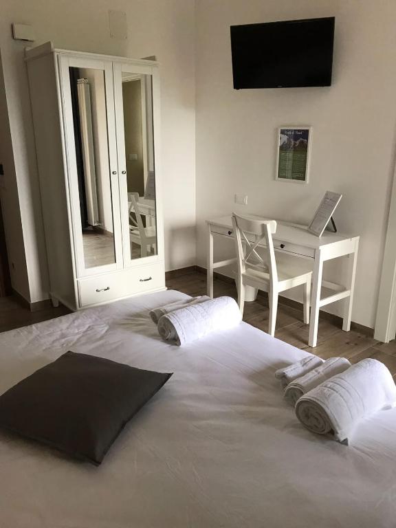 Łóżko lub łóżka w pokoju w obiekcie Villa Lò