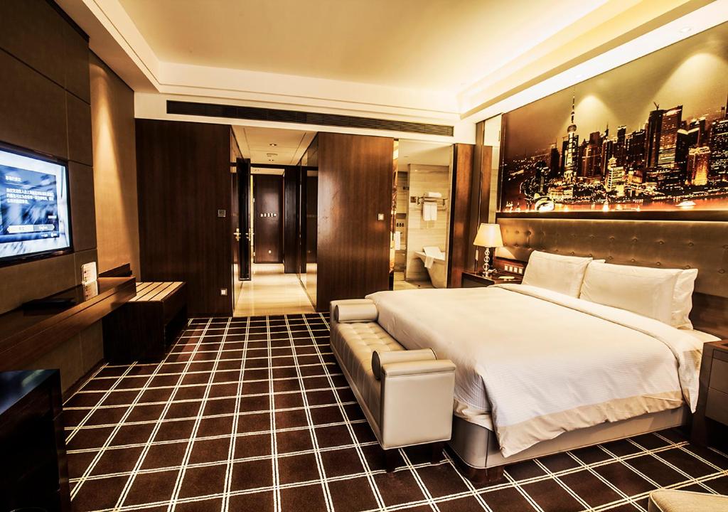TV a/nebo společenská místnost v ubytování Royal Century Hotel Shanghai