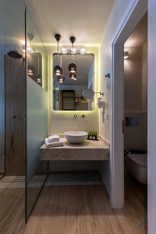 Kúpeľňa v ubytovaní Poseidon Hotel Suites