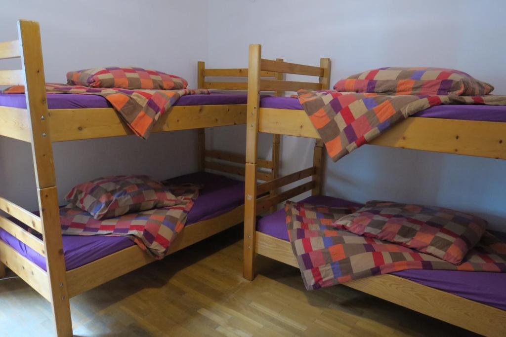Postel nebo postele na pokoji v ubytování SnowBunnys BackPackers Hostel