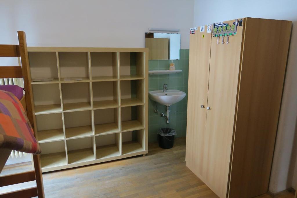 Postel nebo postele na pokoji v ubytování SnowBunnys BackPackers Hostel