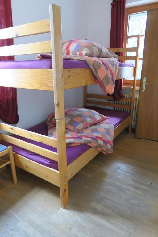 Postel nebo postele na pokoji v ubytování SnowBunnys BackPackers Hostel