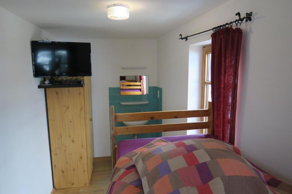 Postel nebo postele na pokoji v ubytování SnowBunnys BackPackers Hostel