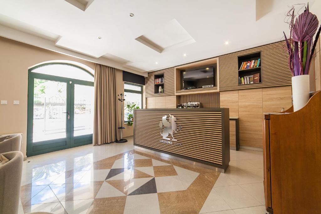 TV a/nebo společenská místnost v ubytování Apartments Grifone Lux