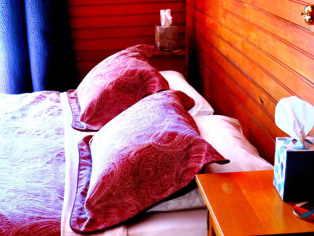 Postel nebo postele na pokoji v ubytování Shady Rest Bed & Breakfast