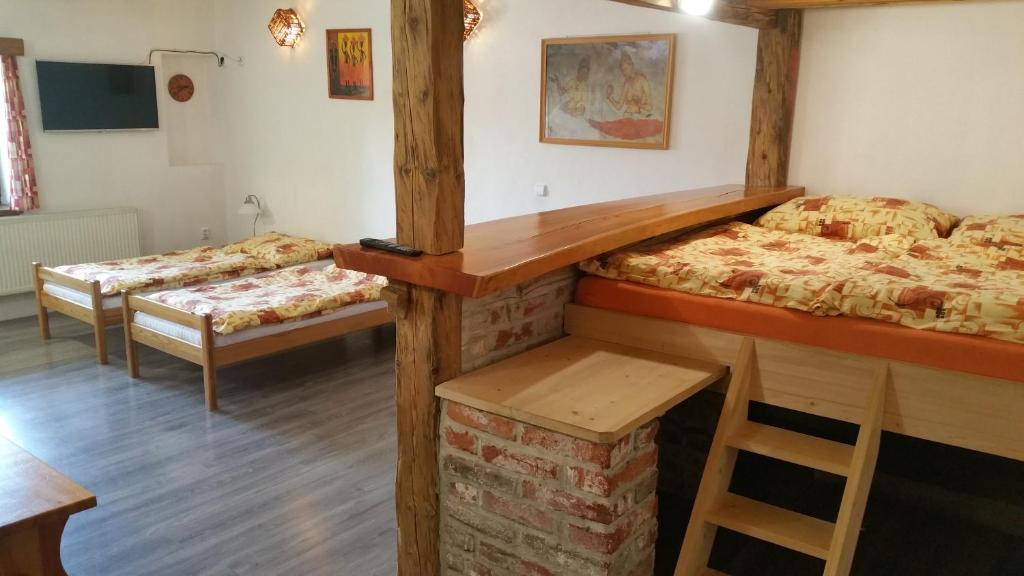 Postel nebo postele na pokoji v ubytování Penzion Filoun