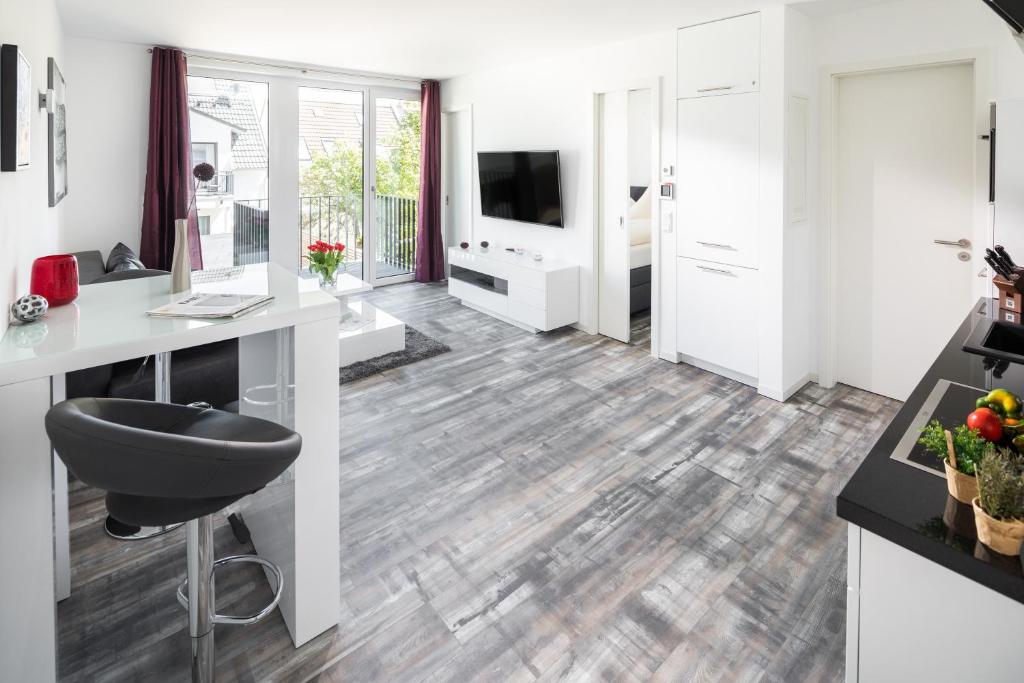 TV a/nebo společenská místnost v ubytování MeerZeit 8 - Norderney - Winterstraße 19