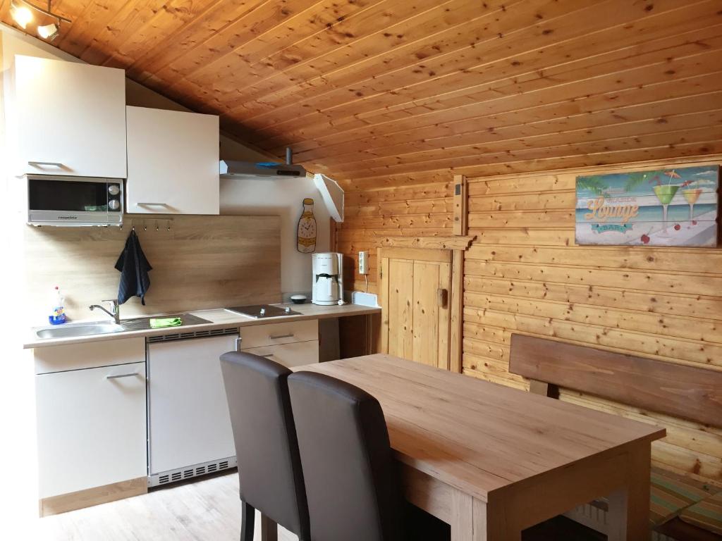 Kuchyň nebo kuchyňský kout v ubytování Karawanken Lodge