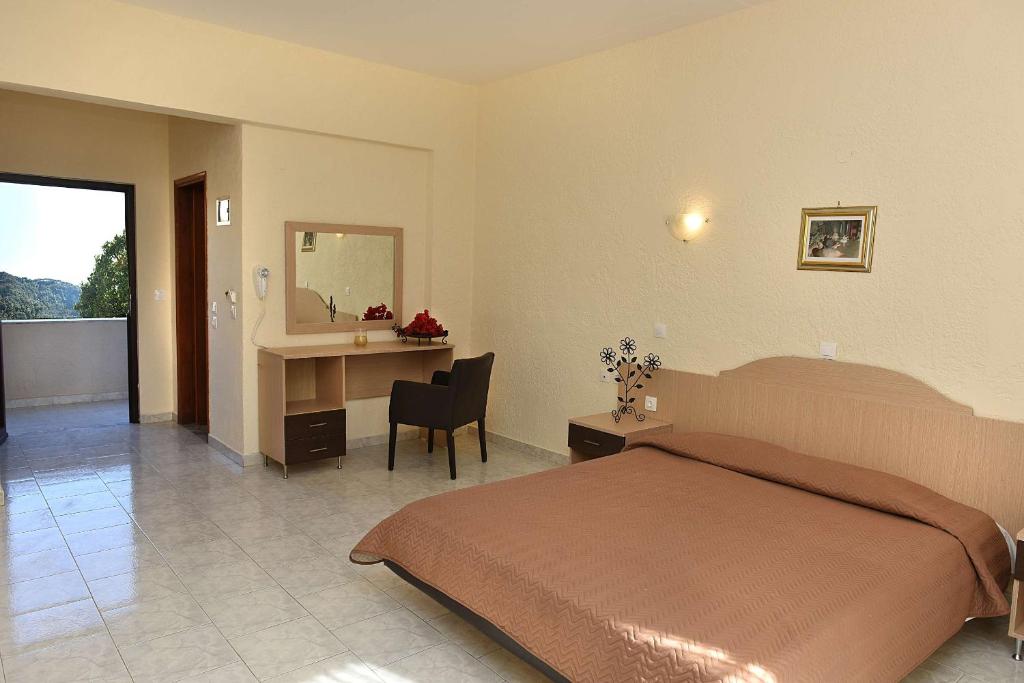 Postel nebo postele na pokoji v ubytování Santa Helena Hotel