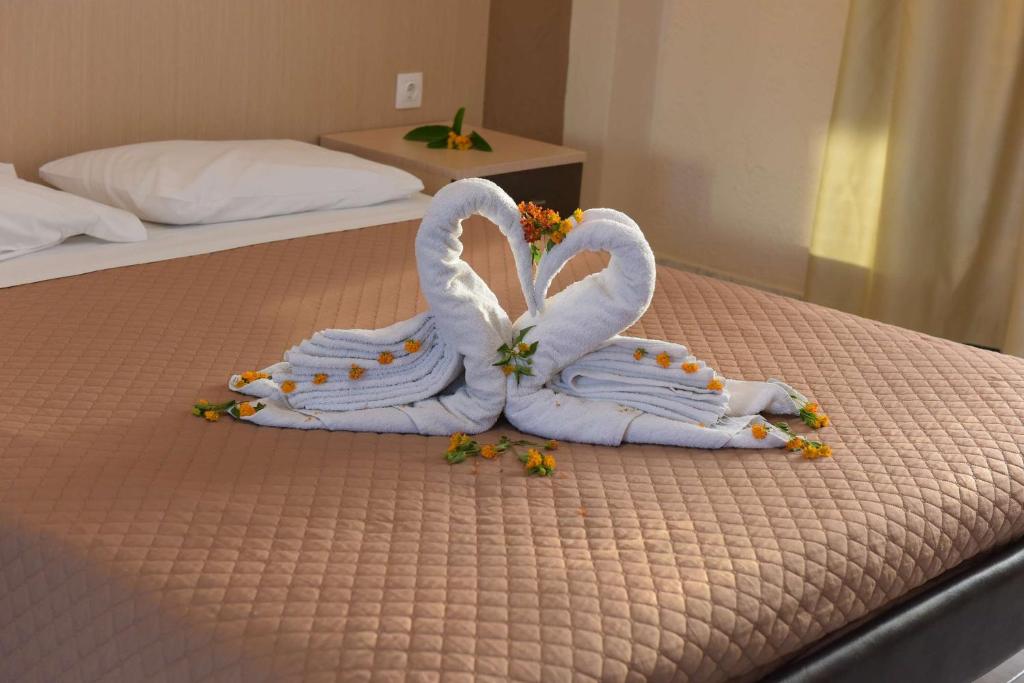 Postel nebo postele na pokoji v ubytování Santa Helena Hotel