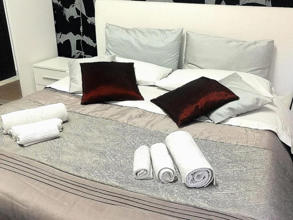 Ένα ή περισσότερα κρεβάτια σε δωμάτιο στο Acanto Room Suite