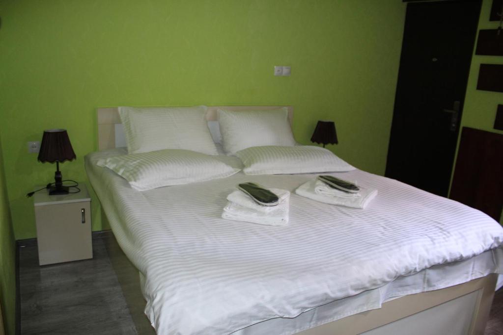 Postel nebo postele na pokoji v ubytování Salome Guest House