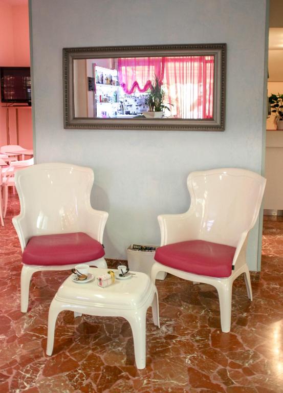 Posezení v ubytování Hotel Très Jolie
