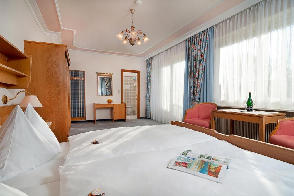 Postel nebo postele na pokoji v ubytování Gästehaus Fertschey