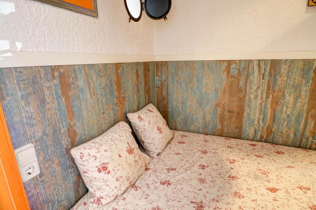 Posteľ alebo postele v izbe v ubytovaní Aquarium Apartment by Hello Homes Sitges