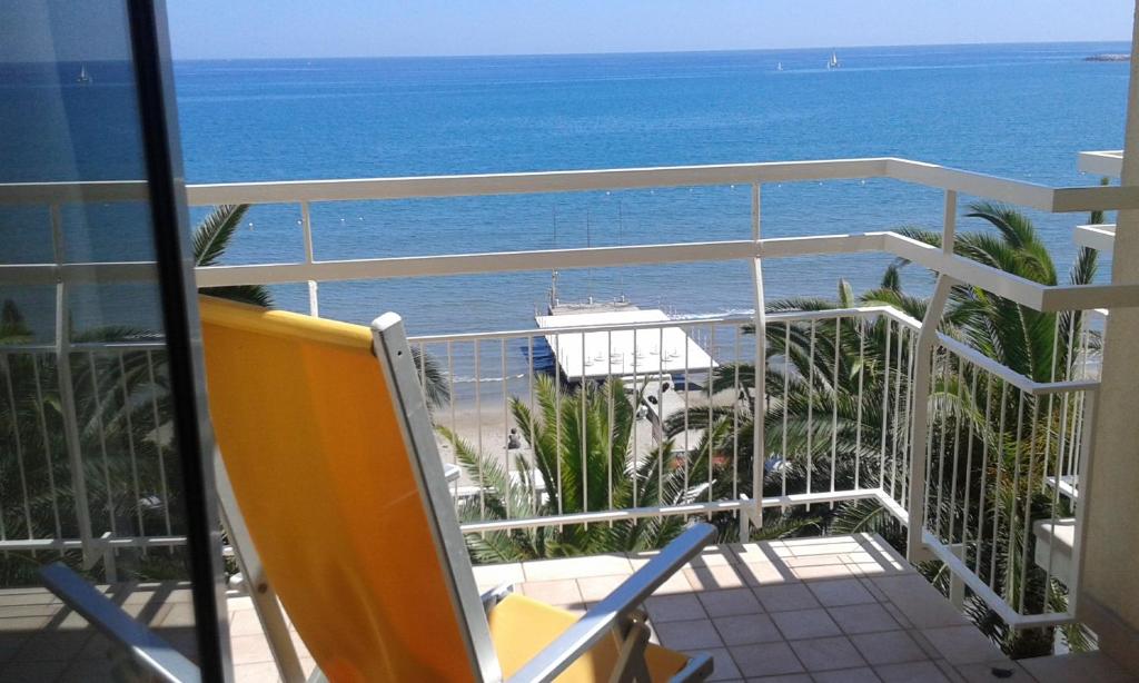 a balcony with a view of the ocean at Hotel Miramare in Diano Marina