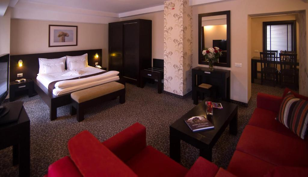 Postel nebo postele na pokoji v ubytování Hotel Cherica