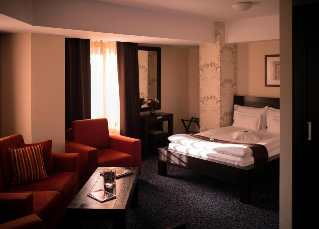 Postel nebo postele na pokoji v ubytování Hotel Cherica