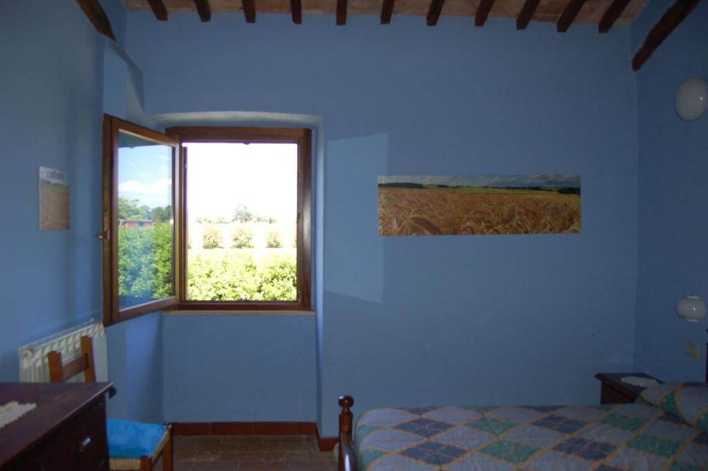 A bed or beds in a room at Agriturismo Castro