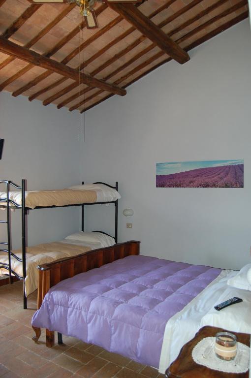 A bed or beds in a room at Agriturismo Castro