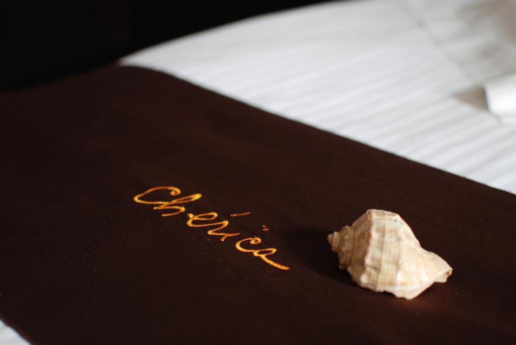 Postel nebo postele na pokoji v ubytování Hotel Cherica