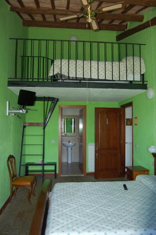 A bed or beds in a room at Agriturismo Castro