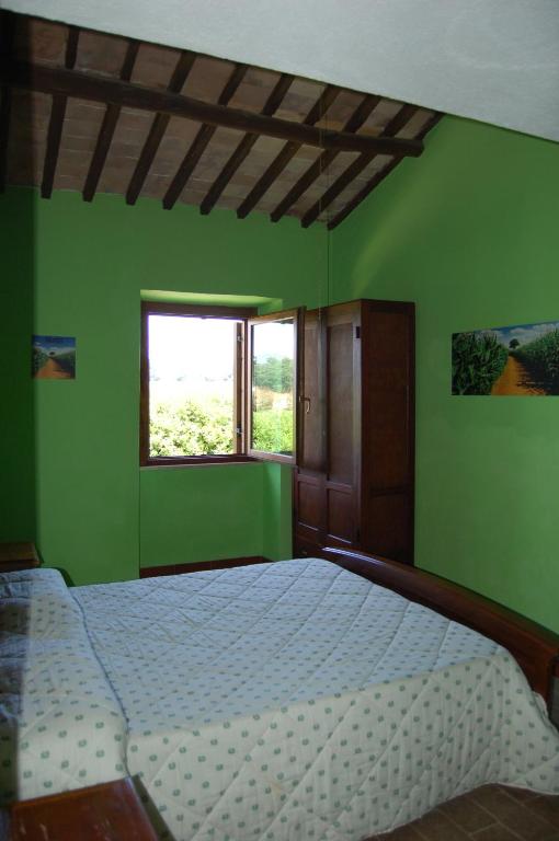 A bed or beds in a room at Agriturismo Castro