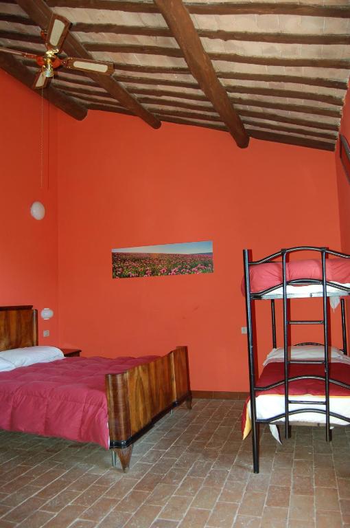 A bed or beds in a room at Agriturismo Castro