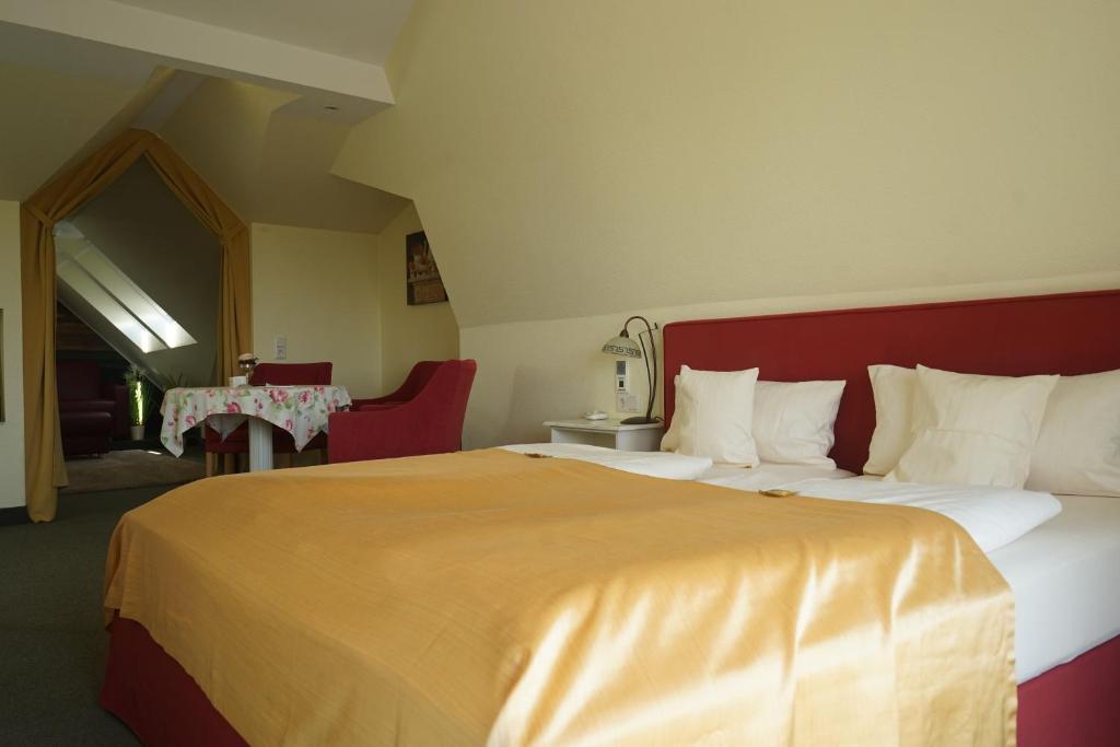 Postel nebo postele na pokoji v ubytování Aparthotel Am Meer