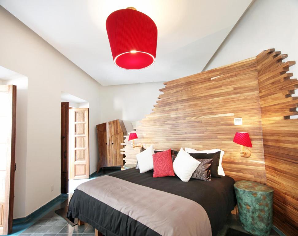 Postel nebo postele na pokoji v ubytování Del Carmen Concept Hotel Boutique by Chai