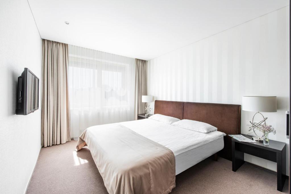 Lova arba lovos apgyvendinimo įstaigoje Amberton Hotel Klaipeda