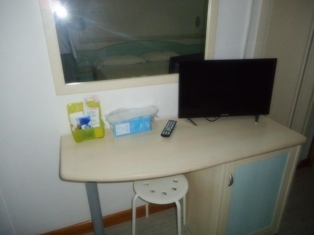 TV a/nebo společenská místnost v ubytování Hotel Carol