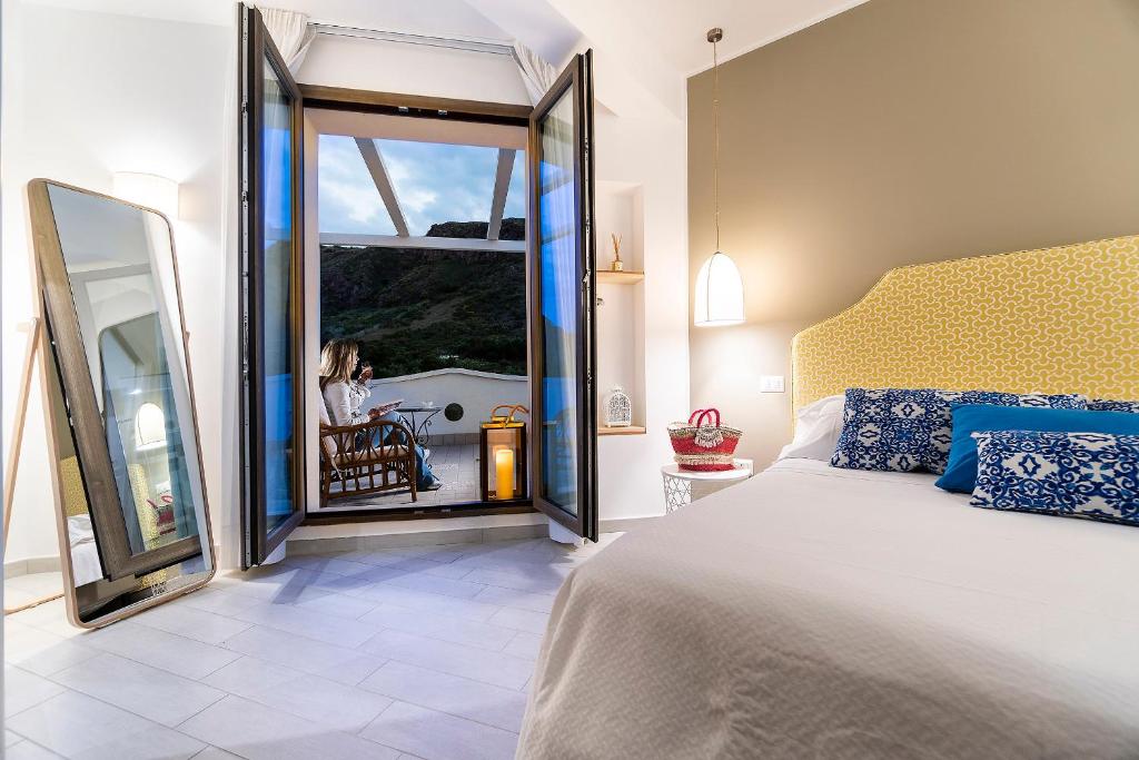 Postel nebo postele na pokoji v ubytování Hotel Orsa Maggiore