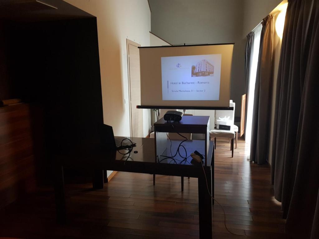 TV a/nebo společenská místnost v ubytování Hotel Hemingway Residence