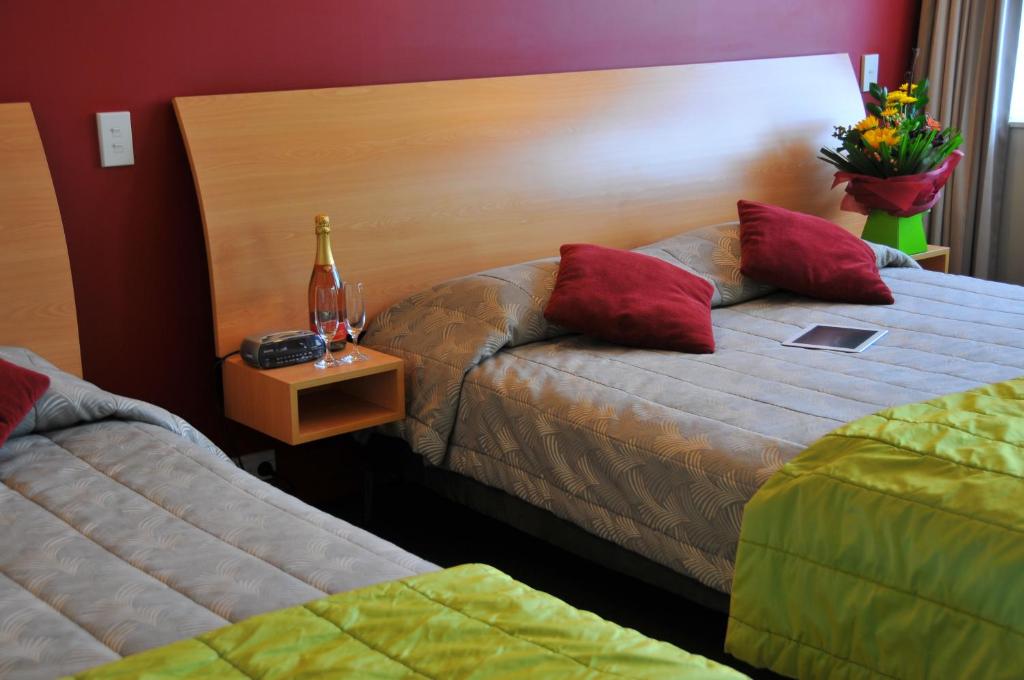 Postel nebo postele na pokoji v ubytování Park View Motor Lodge