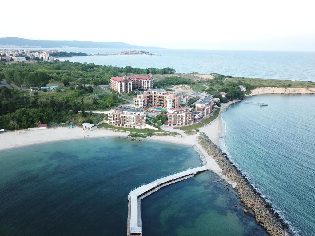 an aerial view of a resort on a beach at St. Panteleimon Beach Hotel in Nesebar