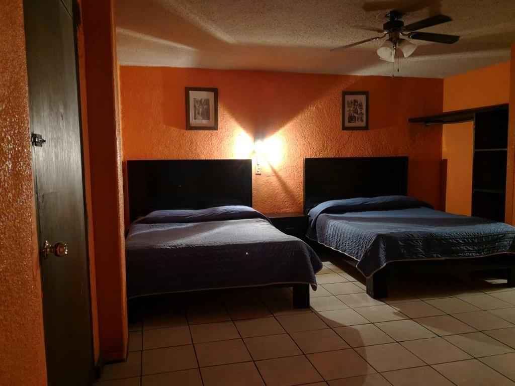 Postel nebo postele na pokoji v ubytování Hotel del Conde