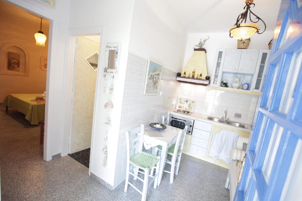 Kuchyň nebo kuchyňský kout v ubytování Butterfly View Suites