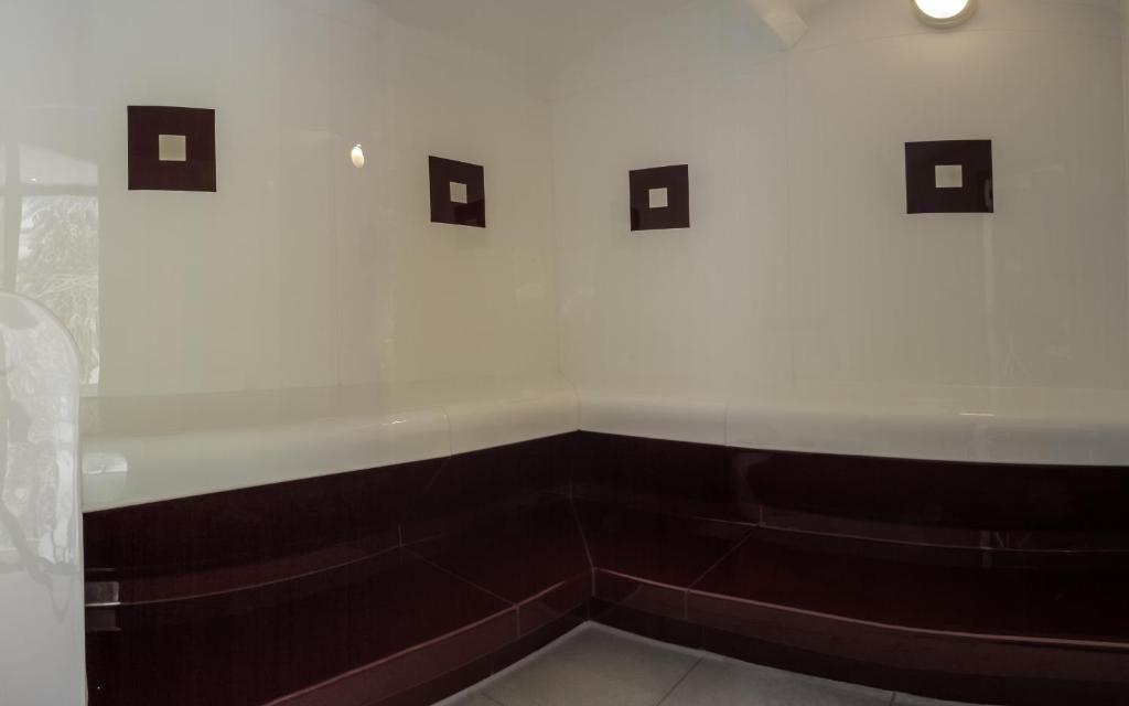 Posezení v ubytování Hotel ADLER Carezza