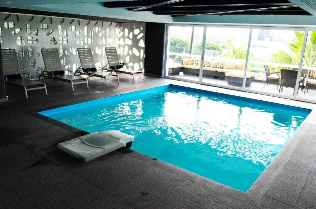 Bazén v ubytování Casa Inn Business Hotel Celaya nebo v jeho okolí
