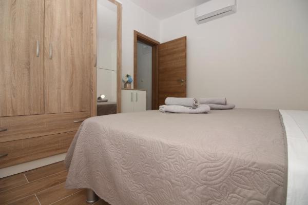 Postel nebo postele na pokoji v ubytování Mara